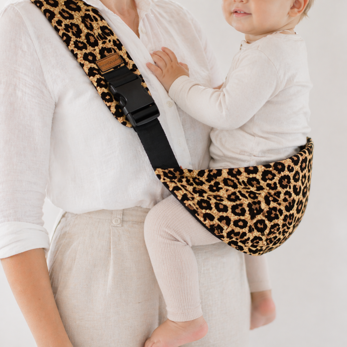 Porte bébé léopard 12 mois et plus
