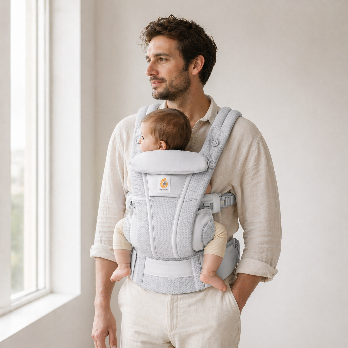 Porte bébé gris 6 à 9 mois