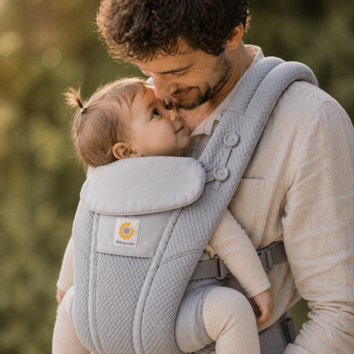 Porte bébé gris 9 à 12 mois